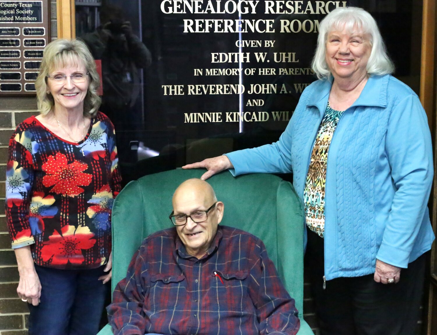 From left, Susan Few of the Daughters of the American Revolution, and Deason Hunt and Karen Pilgrim of the Wood County Genealogical Society, at the Quitman Public Library.
